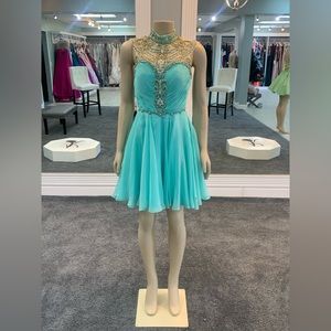 Sheer size 4 cocktail gown. High neck. keyhole back. fully beaded top. seabreeze